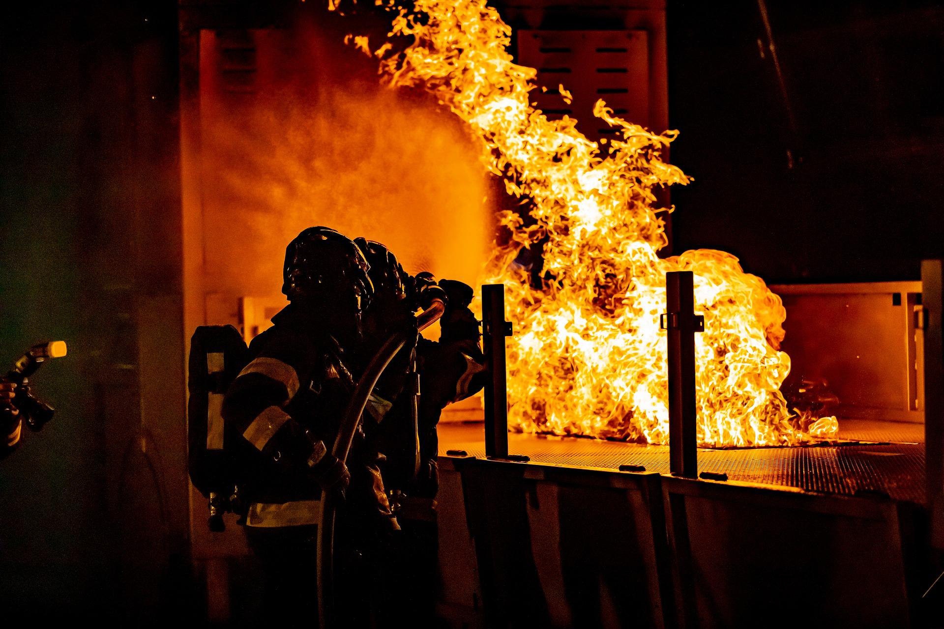 Firefighters trying to stop a fire 